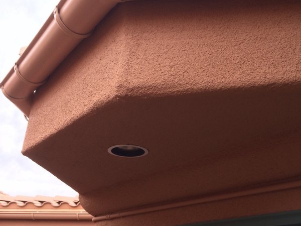 City Seamless half-round rain gutter installation on a custom home.